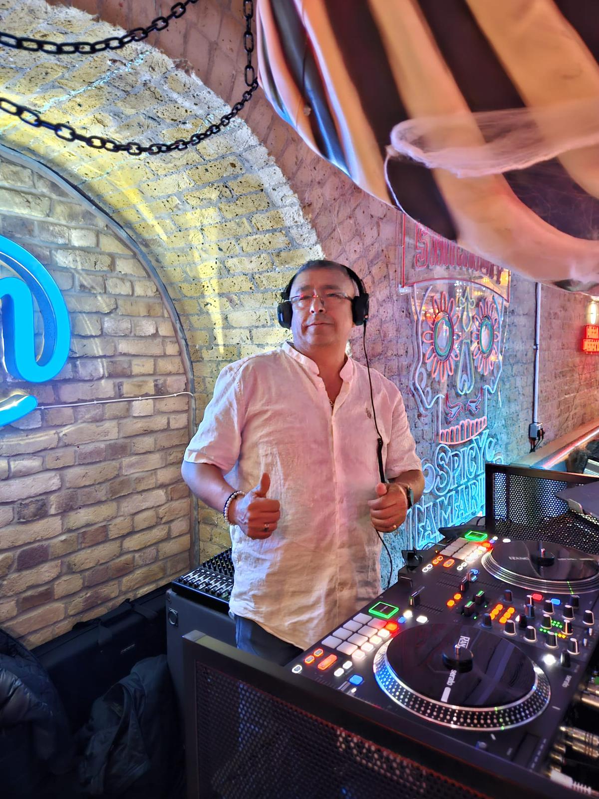 Energised women dancing and celebrating at Ballie Ballerson's colourful ball pit party venue.